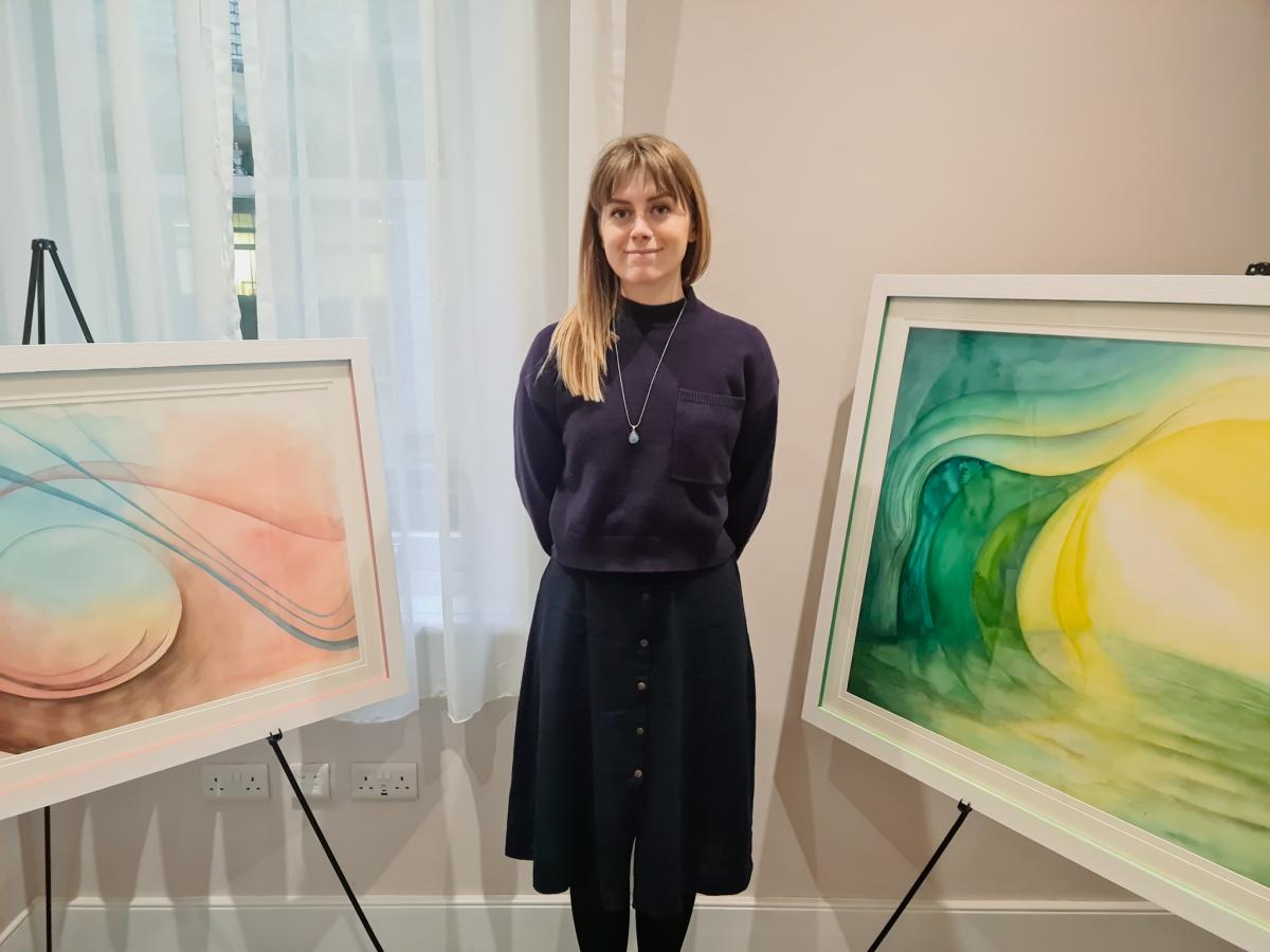 Artist Sarah E Shaw and two of her artworks